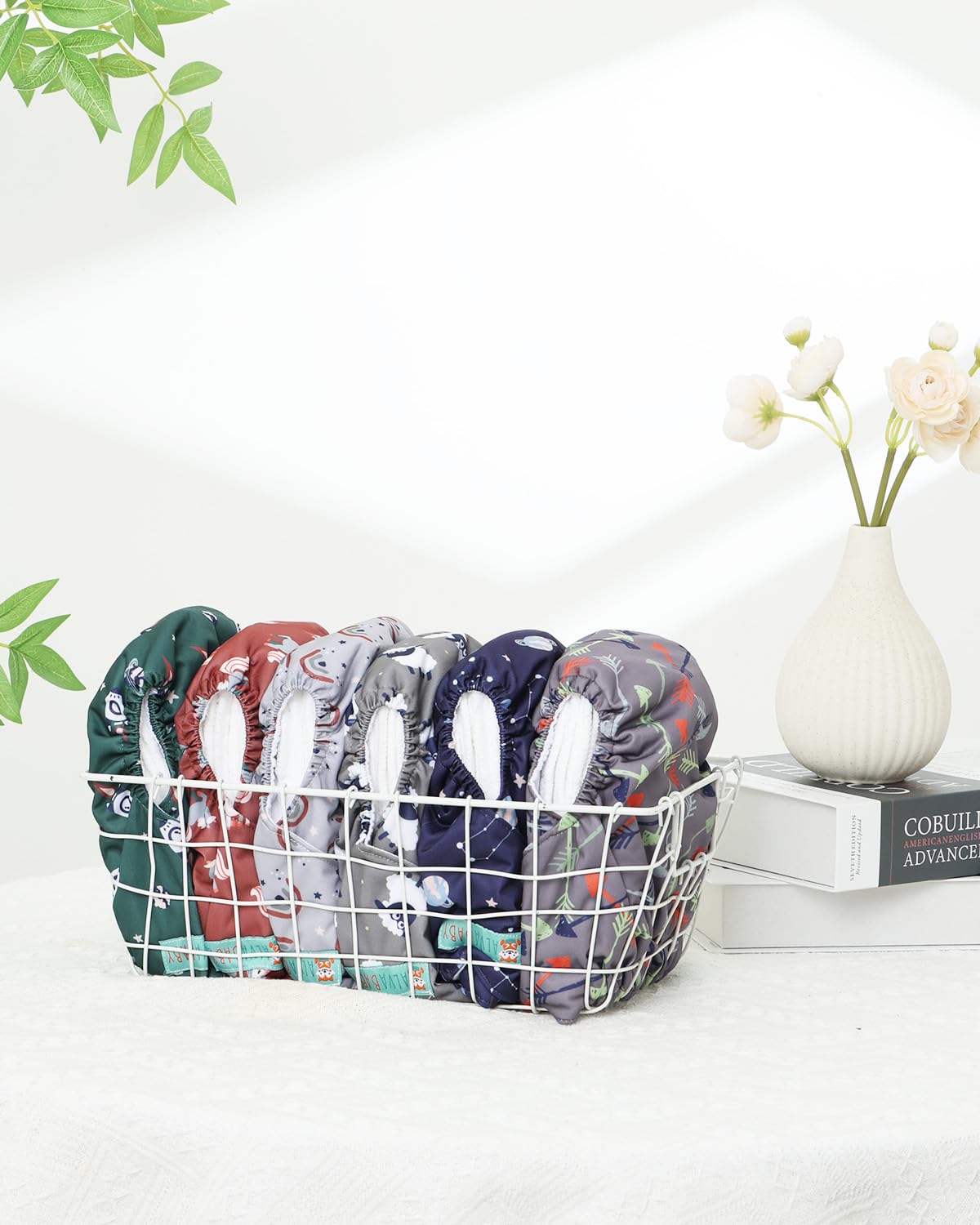 ALVABABY package includes six diapers and twelve inserts for a complete setup.