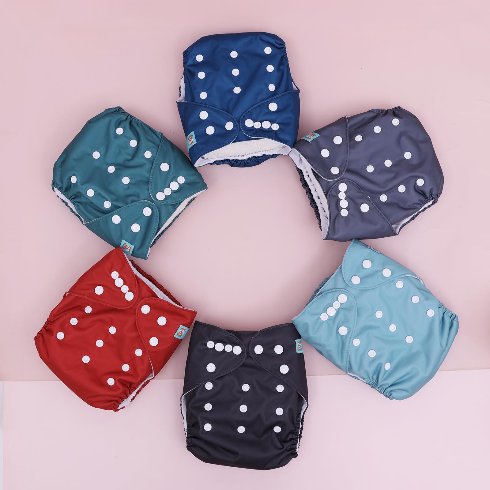 ALVABABY packaging shows six diapers and twelve inserts ready to use