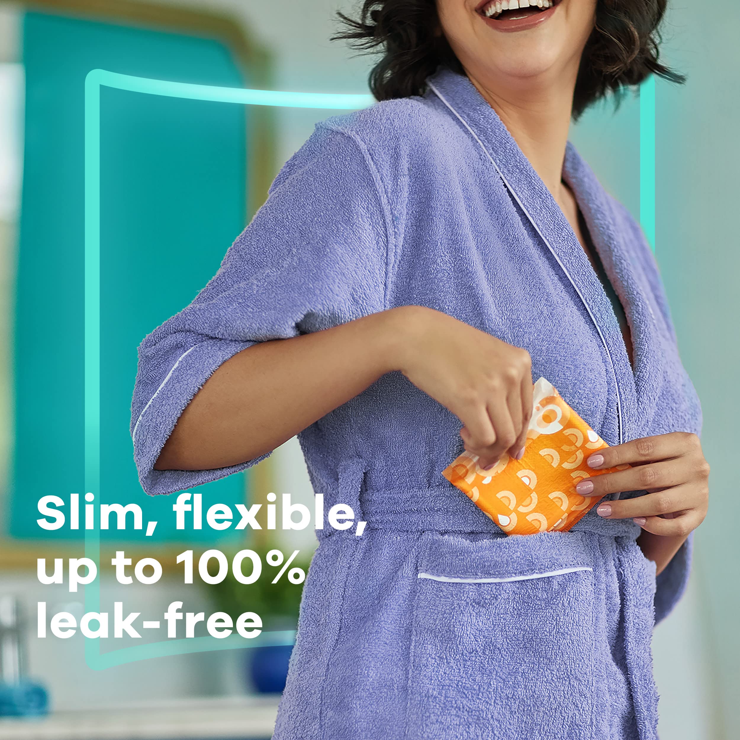 Always Ultra Thin overnight pad with wings rests on soft fabric surface.