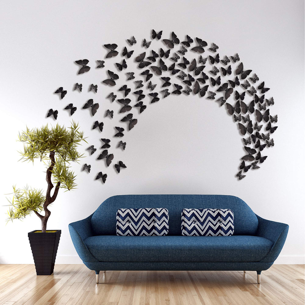 Amaonm 3D butterfly wall decals demonstrate easy application and clean removal.