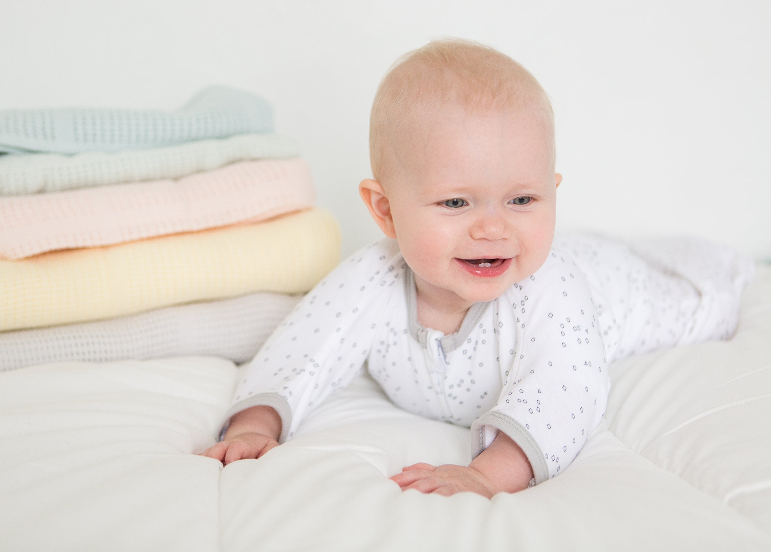 Amazing Baby Cellular Blanket in butterum color adds warm nursery accents.