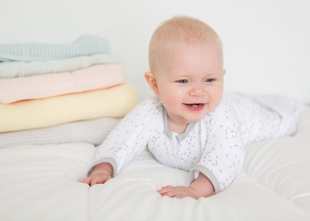 Amazing Baby Cellular Blanket in butterum color adds warm nursery accents.