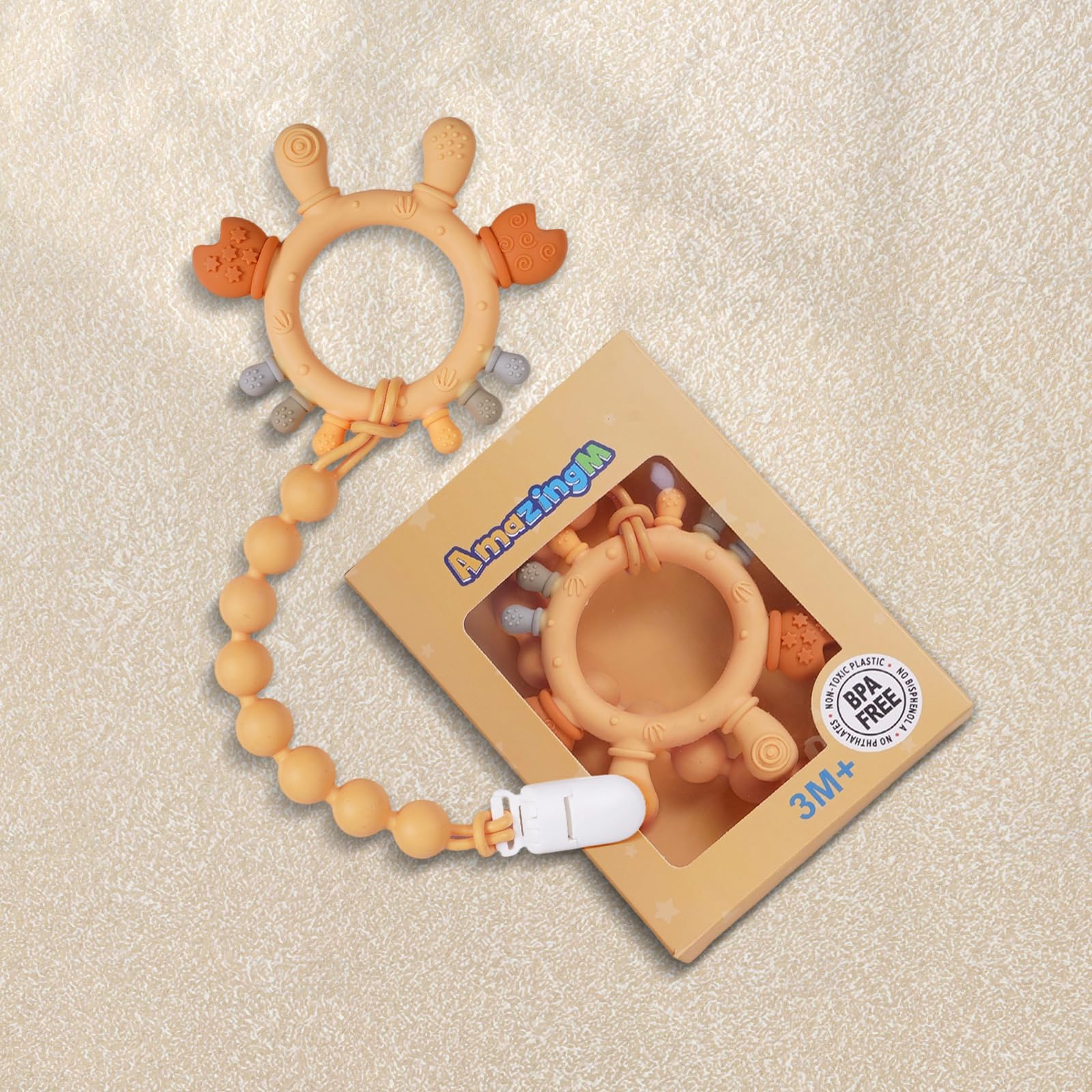 AmazingM clip attached to clothes and stroller for security