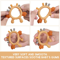 AmazingM pacifier clip in yellow crab attached to clothing