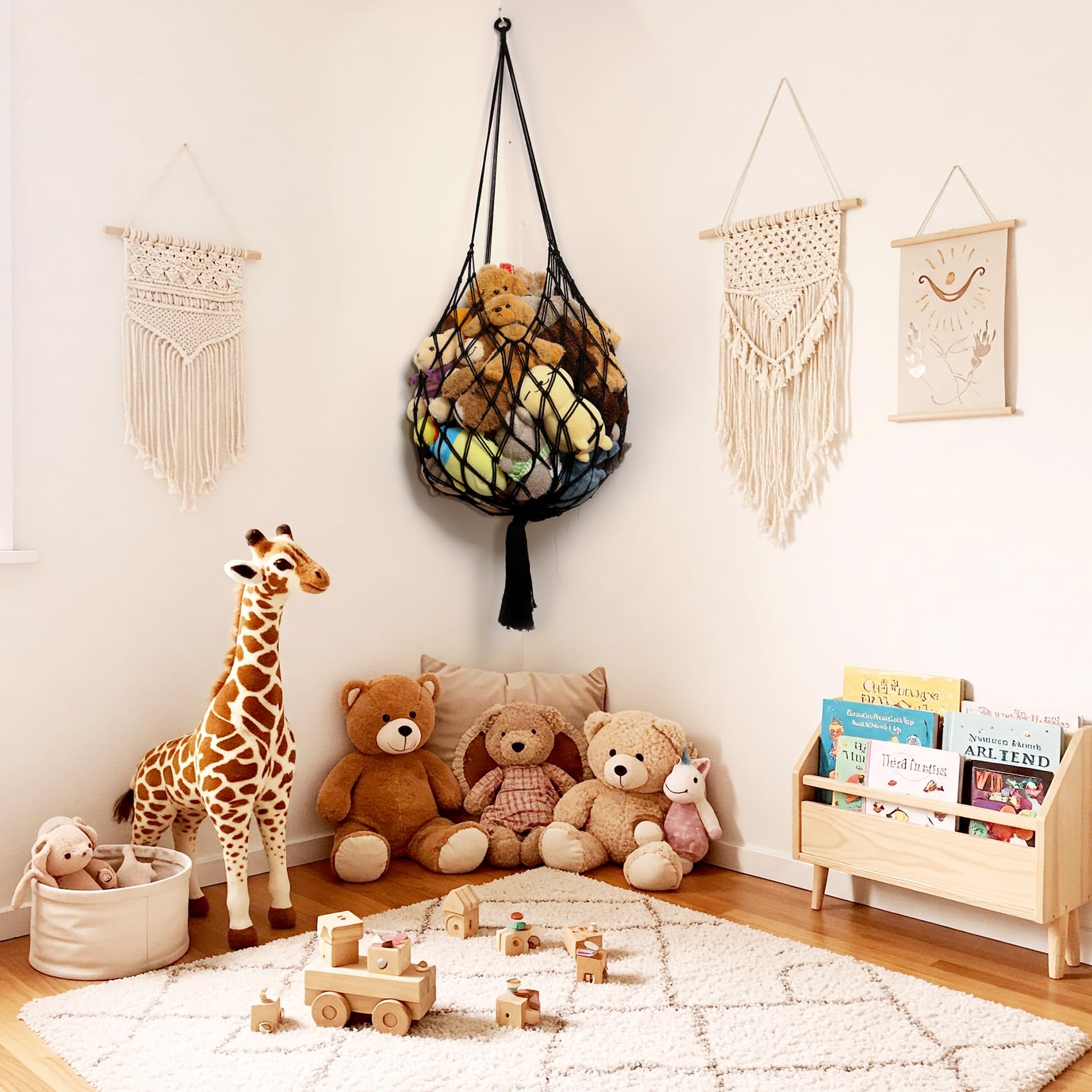 Amdermi hammock mounted to ceiling displays plush collection for easy access.