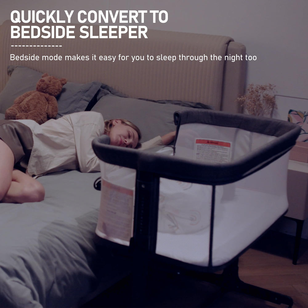 AMKE baby bassinet bedside sleeper with breathable mesh walls for airflow.