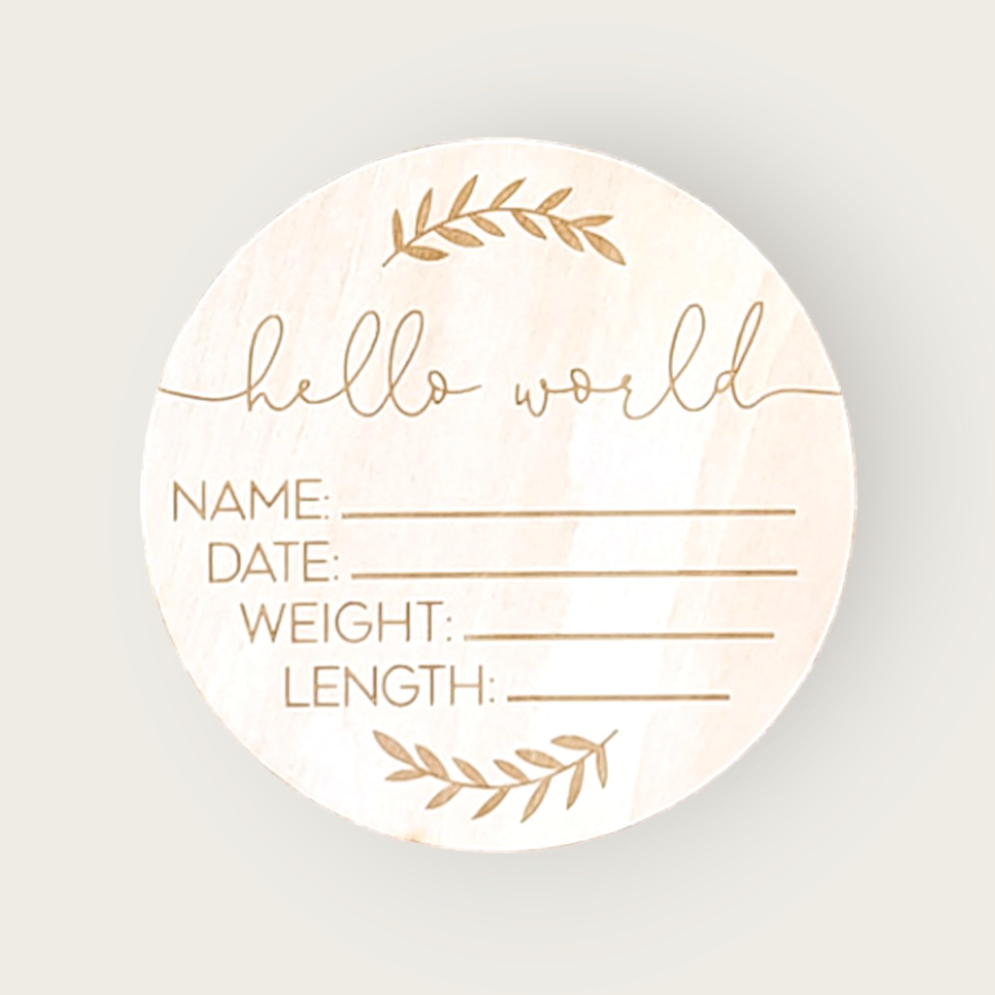 AMOS and SAWYER Hello World Leaf Sign shown with keepsake muslin bag for gifting
