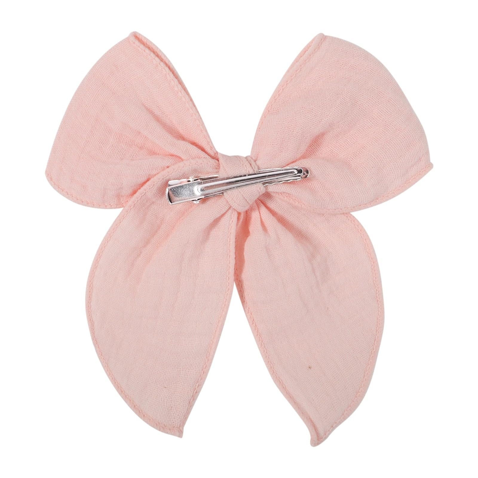 AMYDECOR 5.5-inch bow for baby girls in dark yellow on soft fabric.