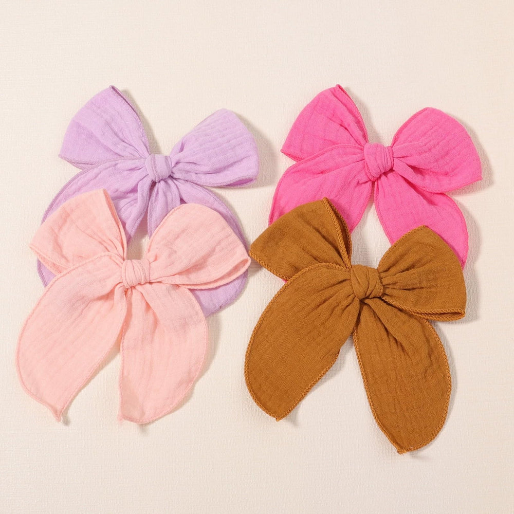 AMYDECOR boutique bow color options match linen tones for any season.