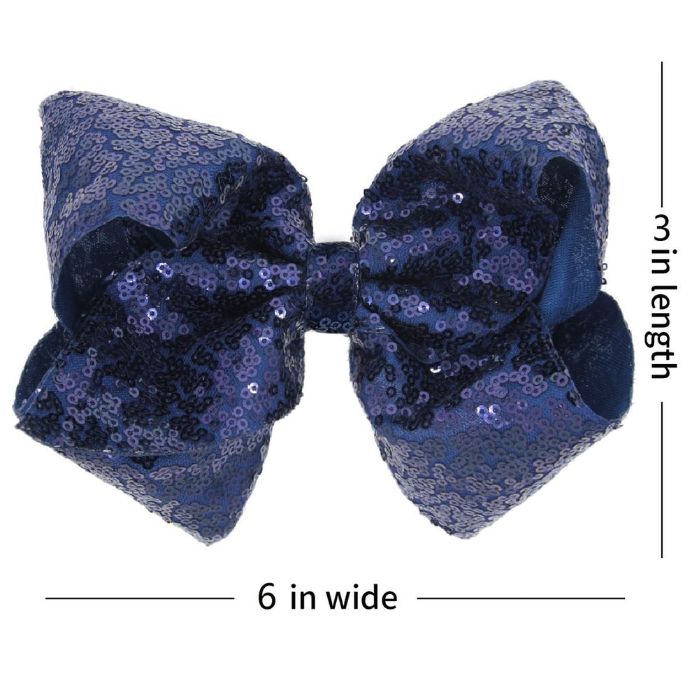 AMYDECOR navy blue sequin bow clip close-up shows secure alligator clip