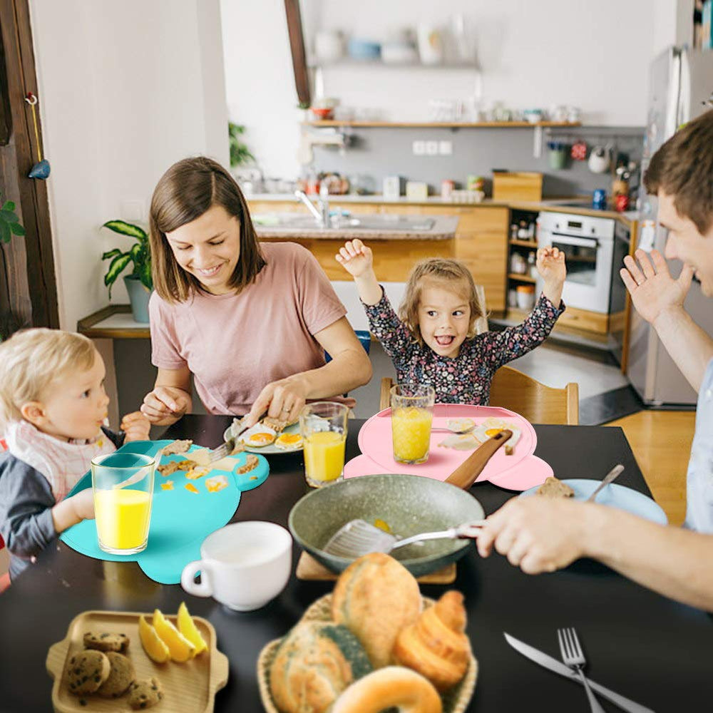Andyken placemat catches crumbs to minimize spills during meals.