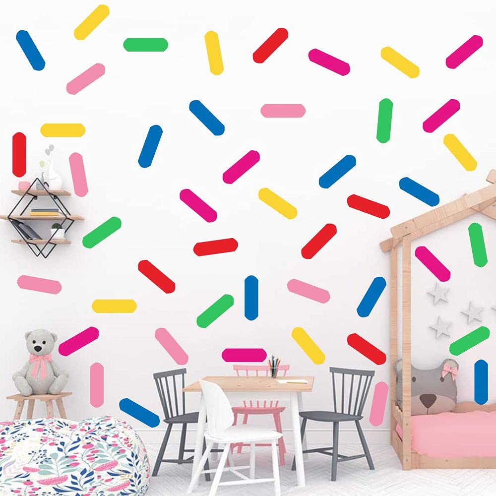ANFRJJI Rainbow Sprinkles wall decal sticks to smooth surfaces without glue.