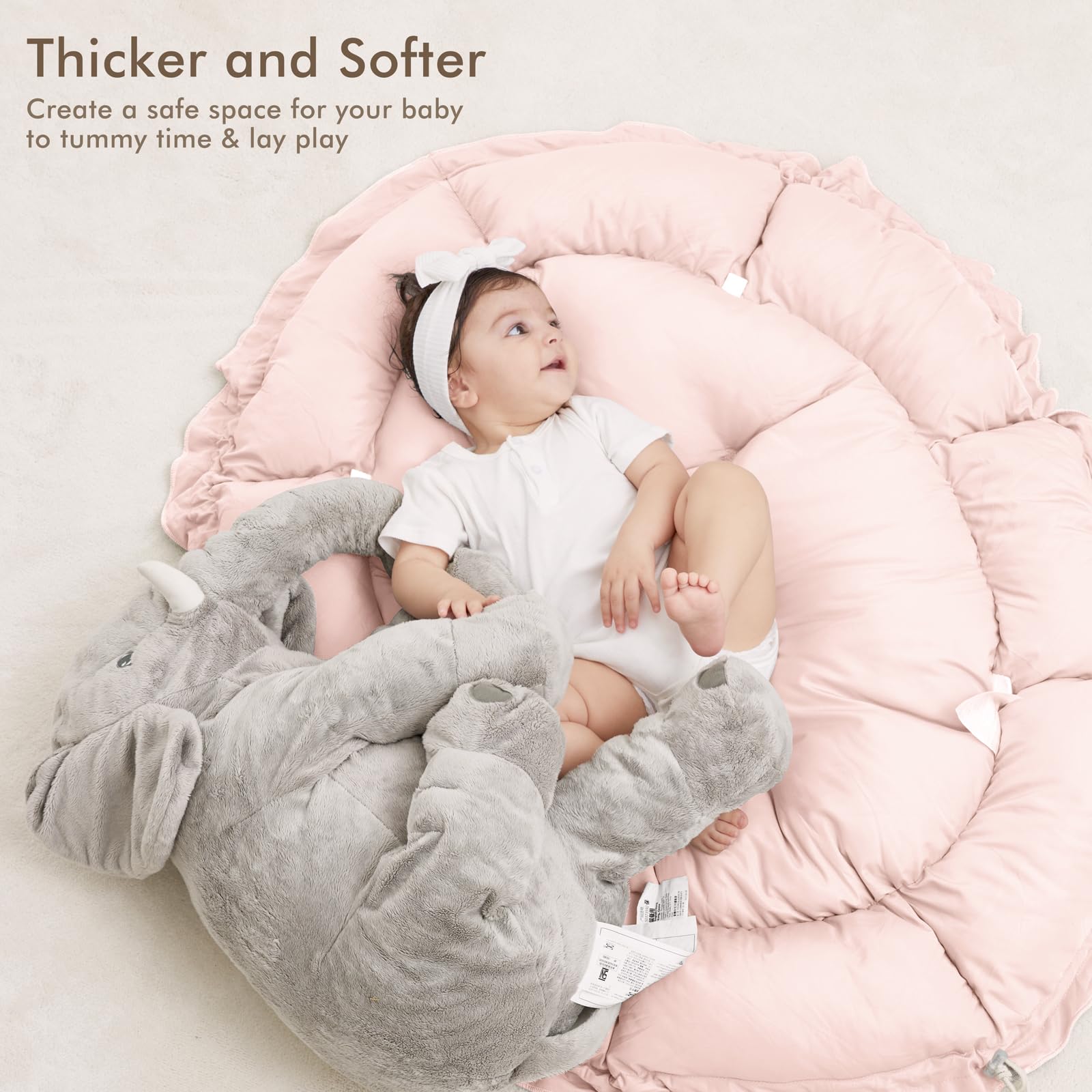 ANGELBLISS reversible tummy time mat offers plush comfort.