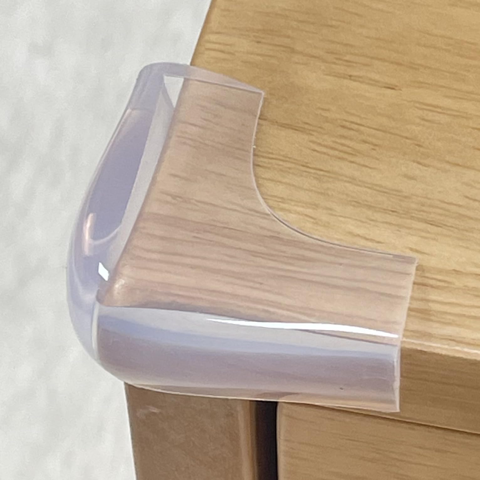 Angloria corner protectors front view shows clear silicone padding for baby safety