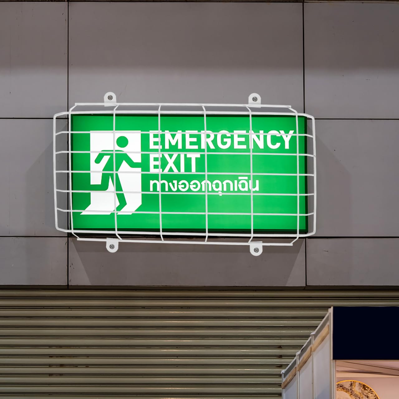 Angoily Iron Exit Sign Cover cinema view emphasizes durability and reliable visibility