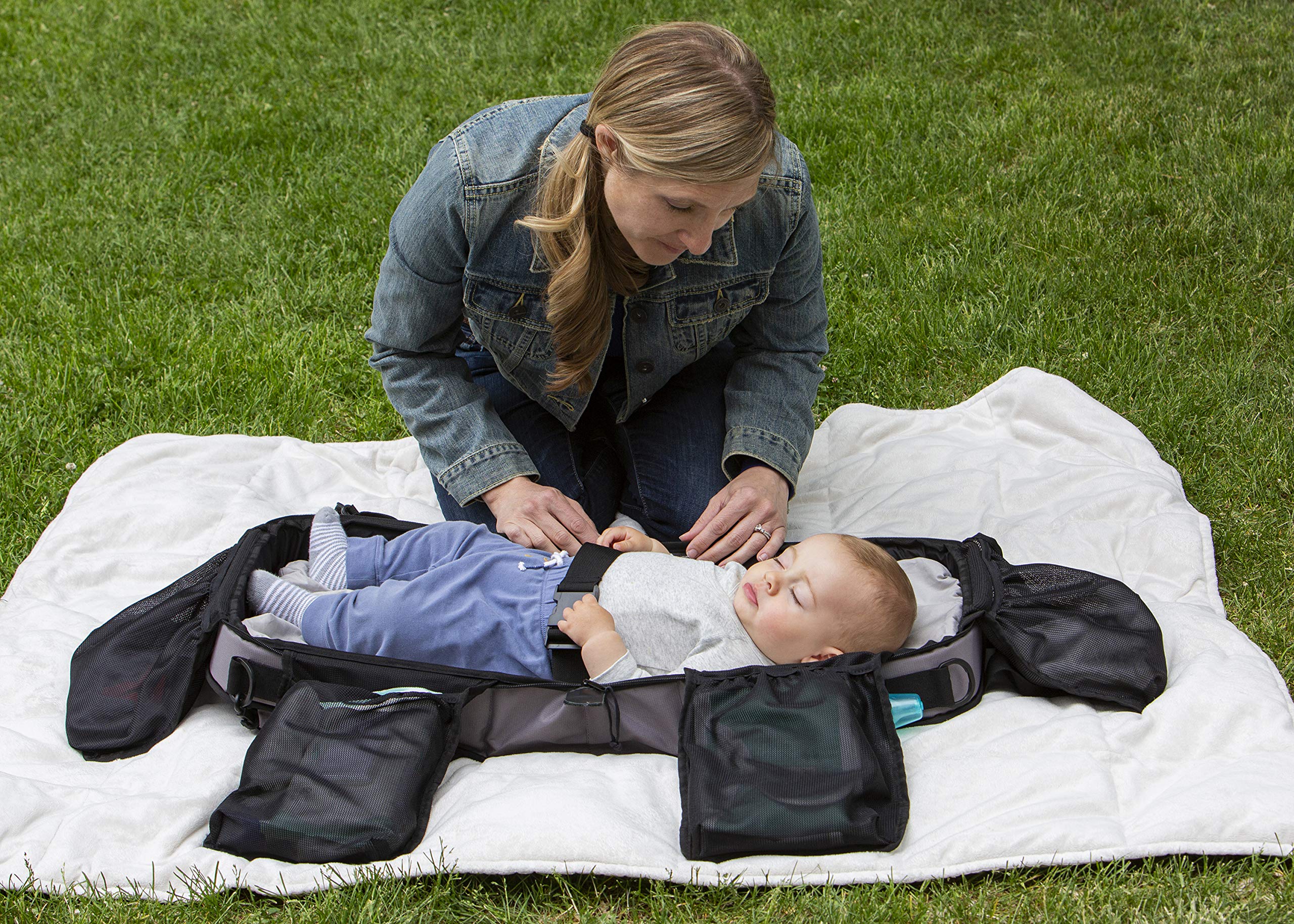 Anna & Eve bag attached to a stroller for hands-free baby gear during outings.