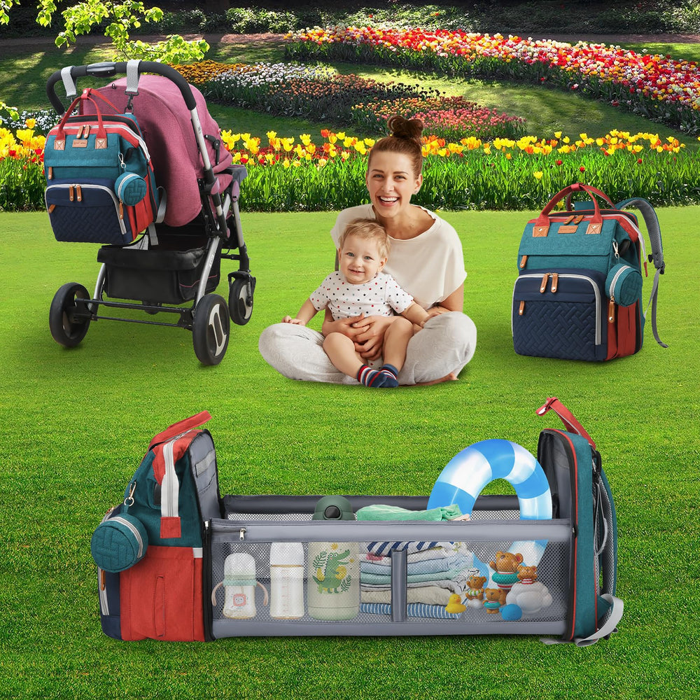 ANWTOTU diaper bag backpack with stroller buckles for hands-free travel.