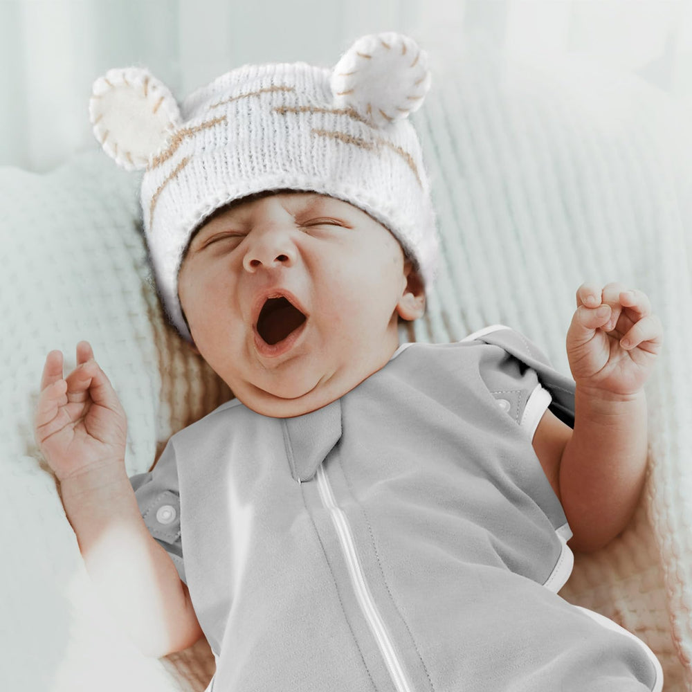 ANYEDDE swaddle with cuffs open shows transition-ready arm design