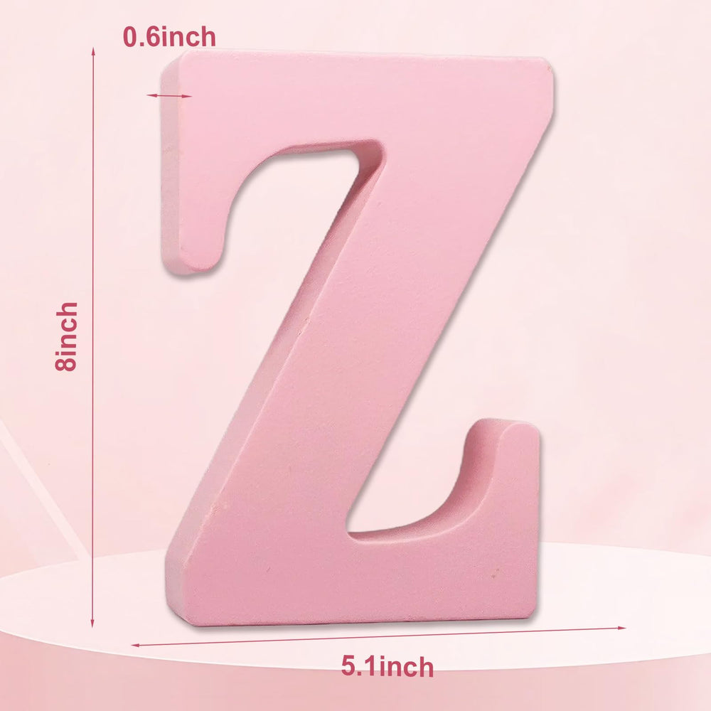 AOCEAN pink wood letter wall decor adds charm to kids' rooms.