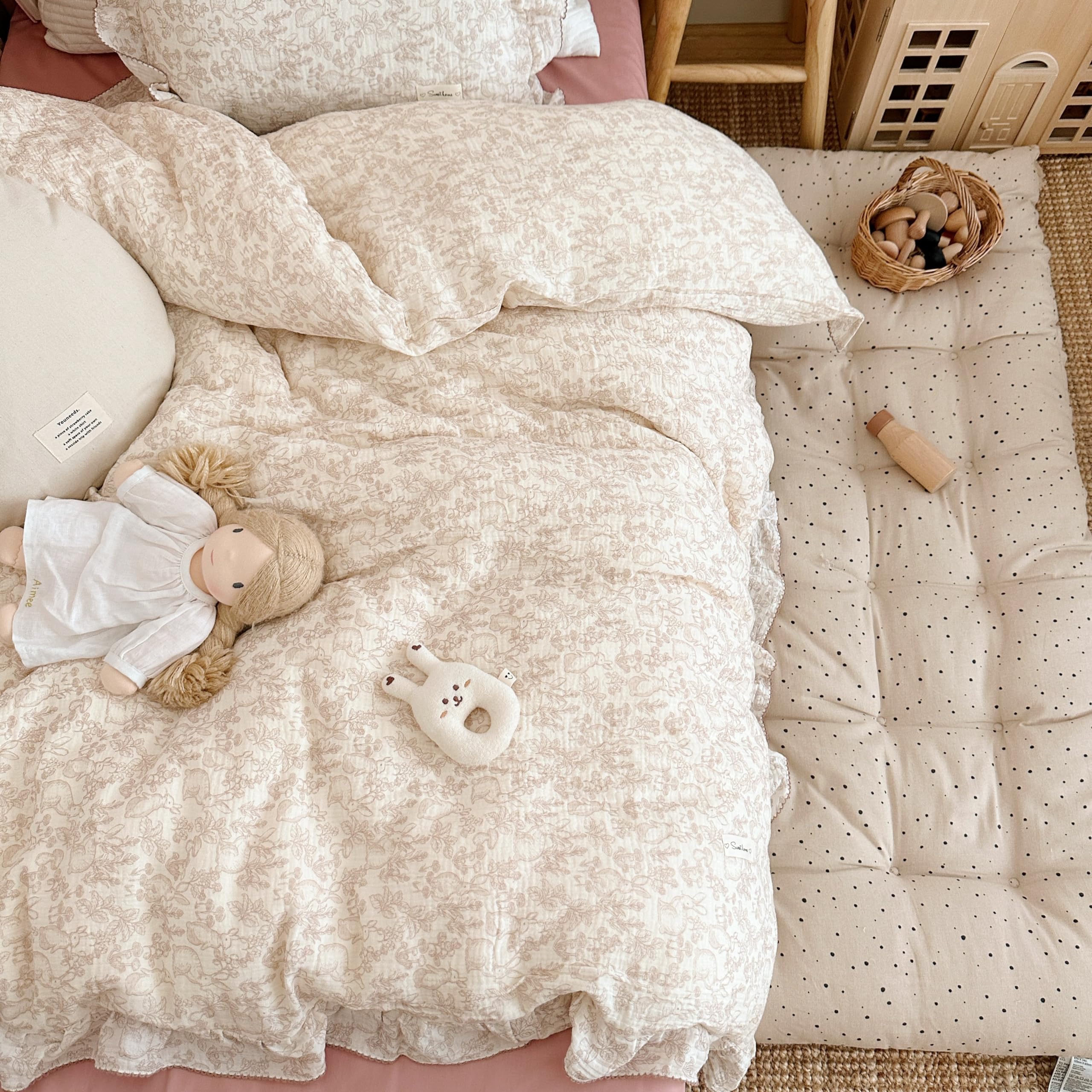 AOJIM forest-pattern duvet cover on bed, ideal for toddler sleep and cozy room decor.