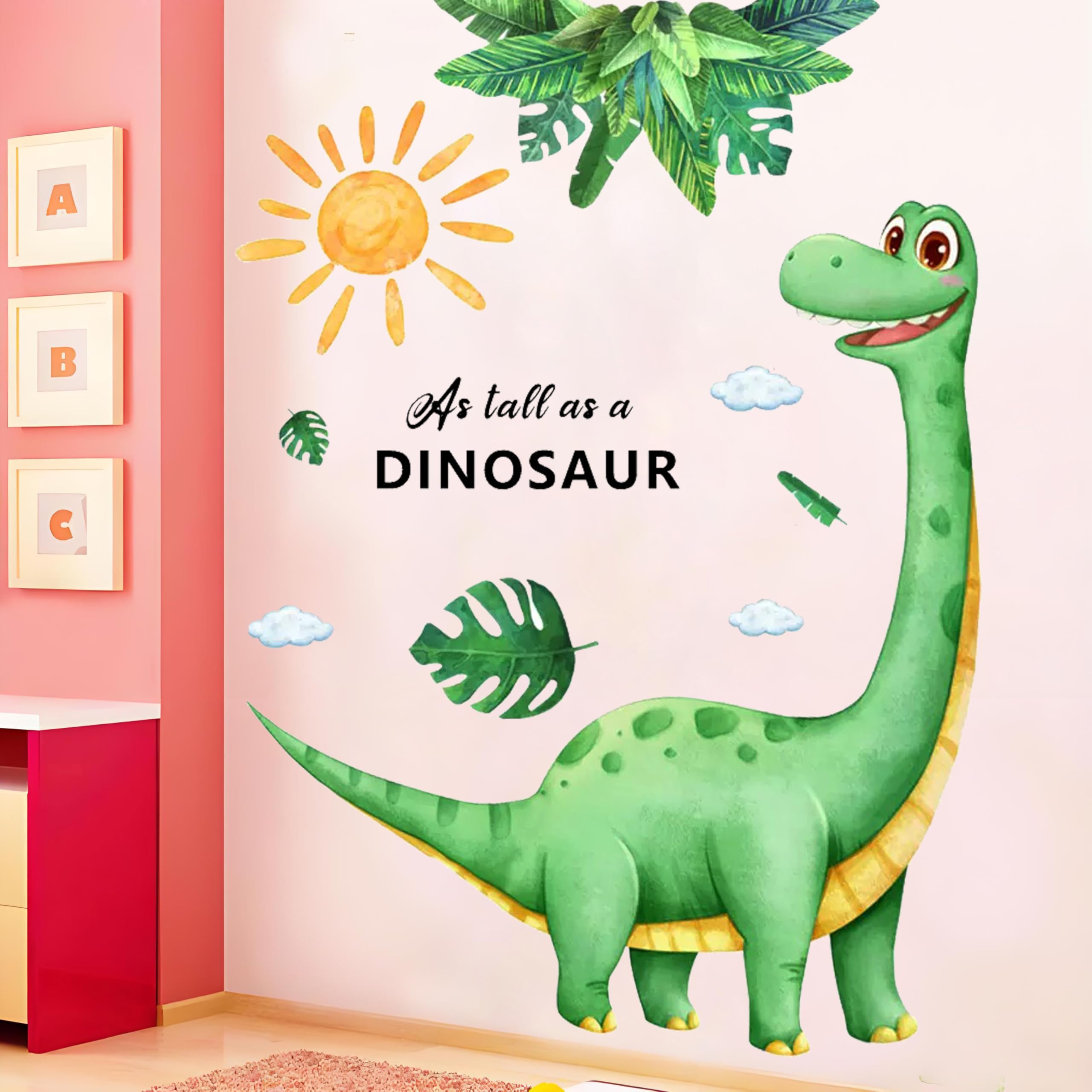 AOLTNRC Brontosaurus wall decal, green with tropical leaves, creates a playful room focal point.