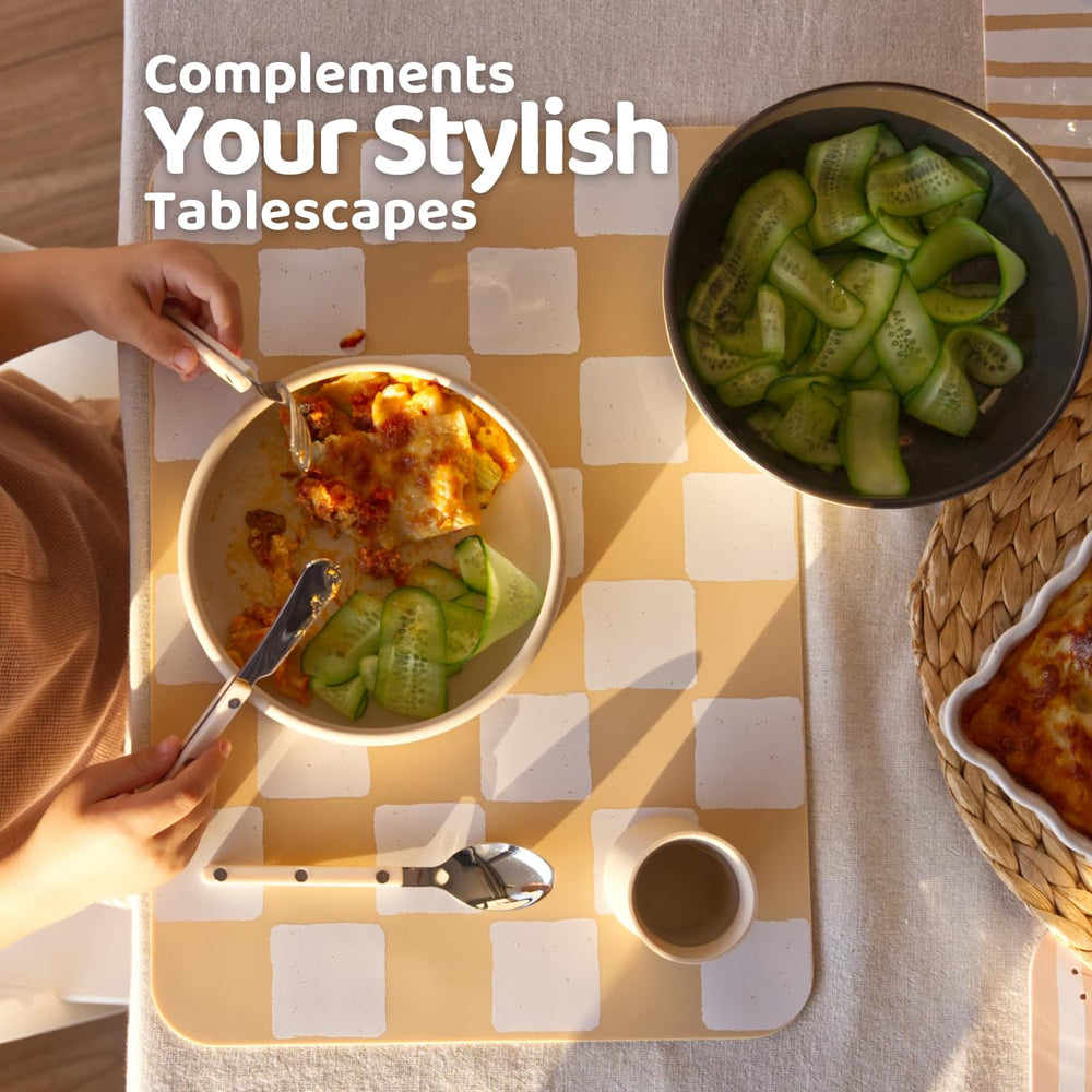 APLAINR training cup with hourglass grip supports independent sipping during weaning.