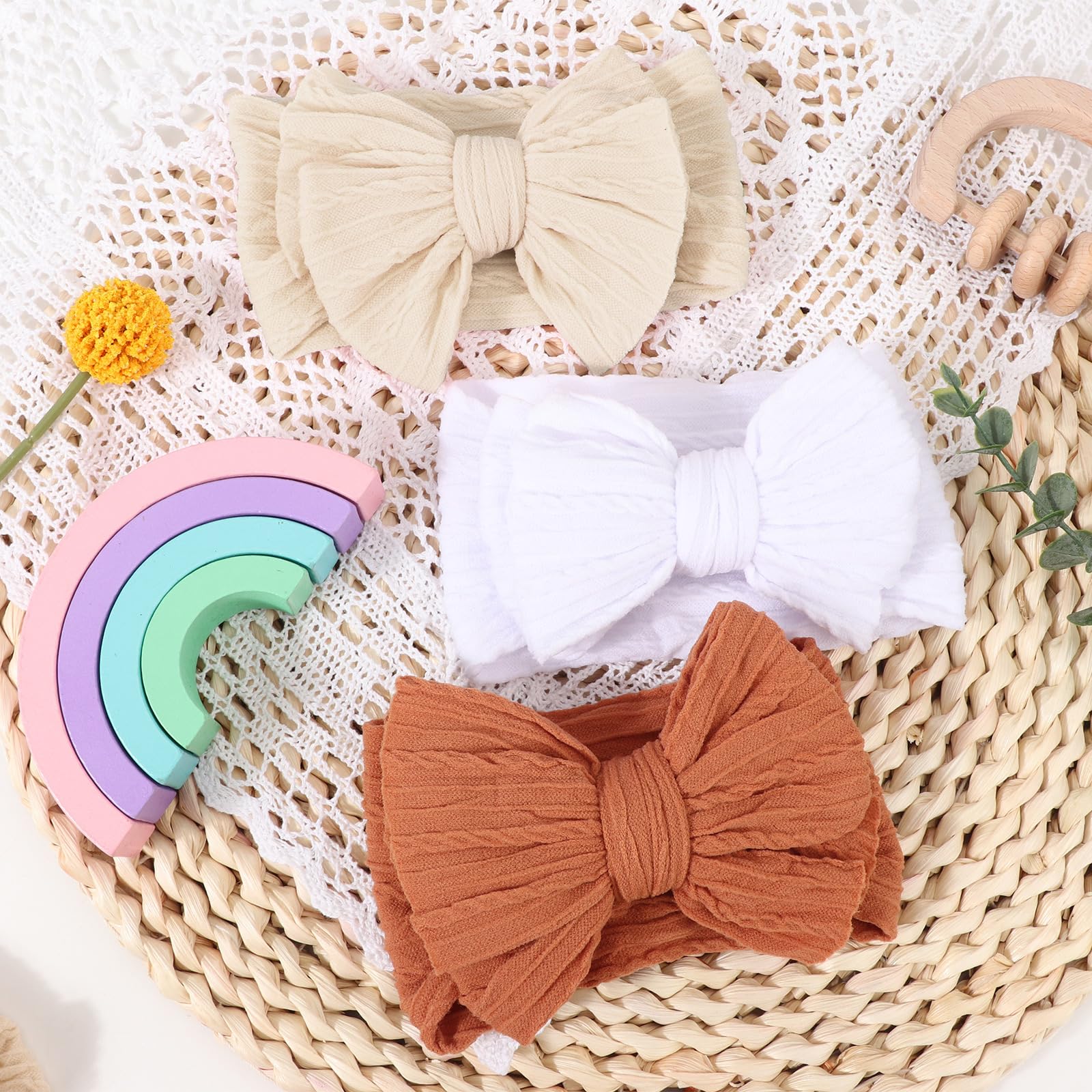 AQOKKA baby bows headband sized for newborns to toddlers with gentle fit