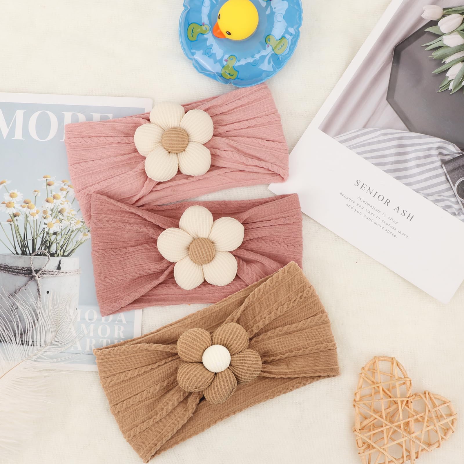 AQOKKA baby flower headband green; stretchy fit grows with baby heads without leaving marks.