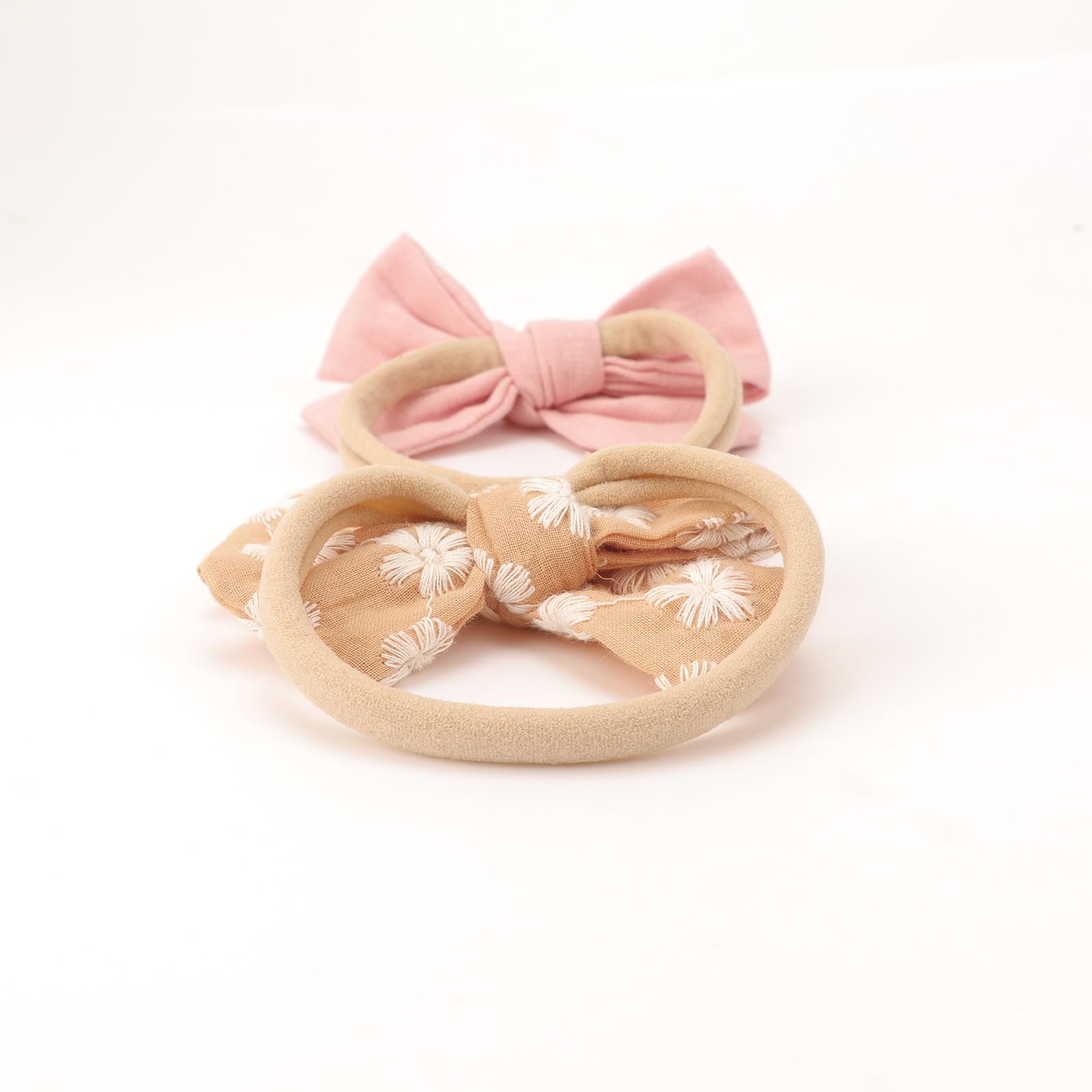 AQOKKA coral suede bow headband; adds charm to toddlers' everyday outfits.