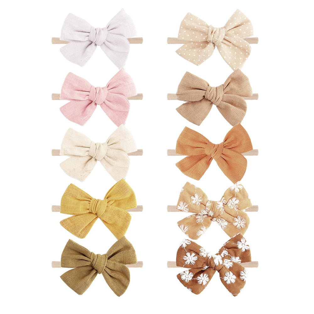 AQOKKA baby headband with mini rose crown offers gentle comfort for newborns.
