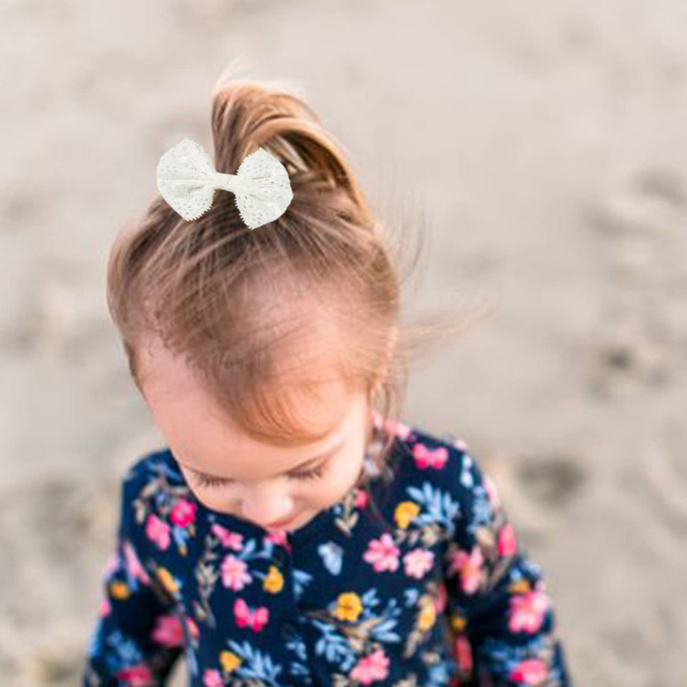 AQOKKA pink butterfly headband adds charm for birthday shoots.