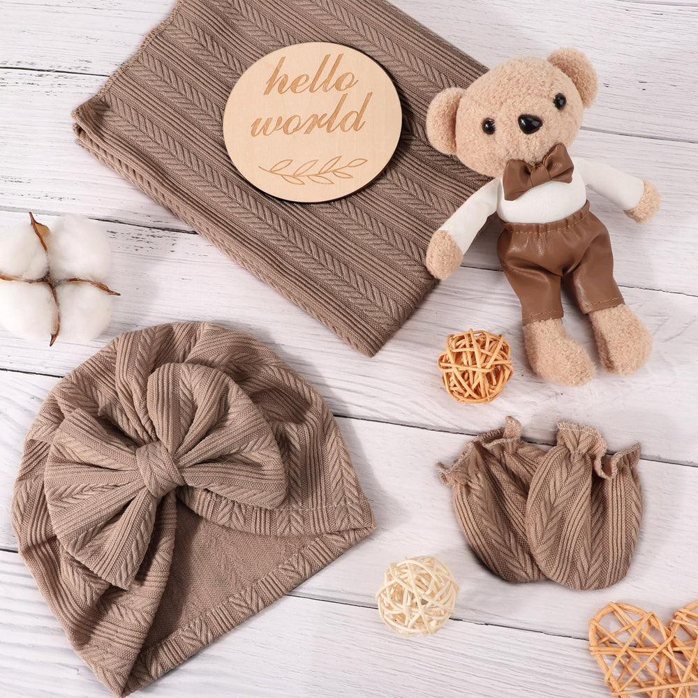 AQOKKA swaddle blanket set shows bow hat and mittens for gentle warmth and easy wrapping.