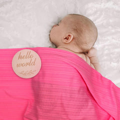 AQOKKA swaddle demonstrates gentle, comfortable positioning for daily wear or photos