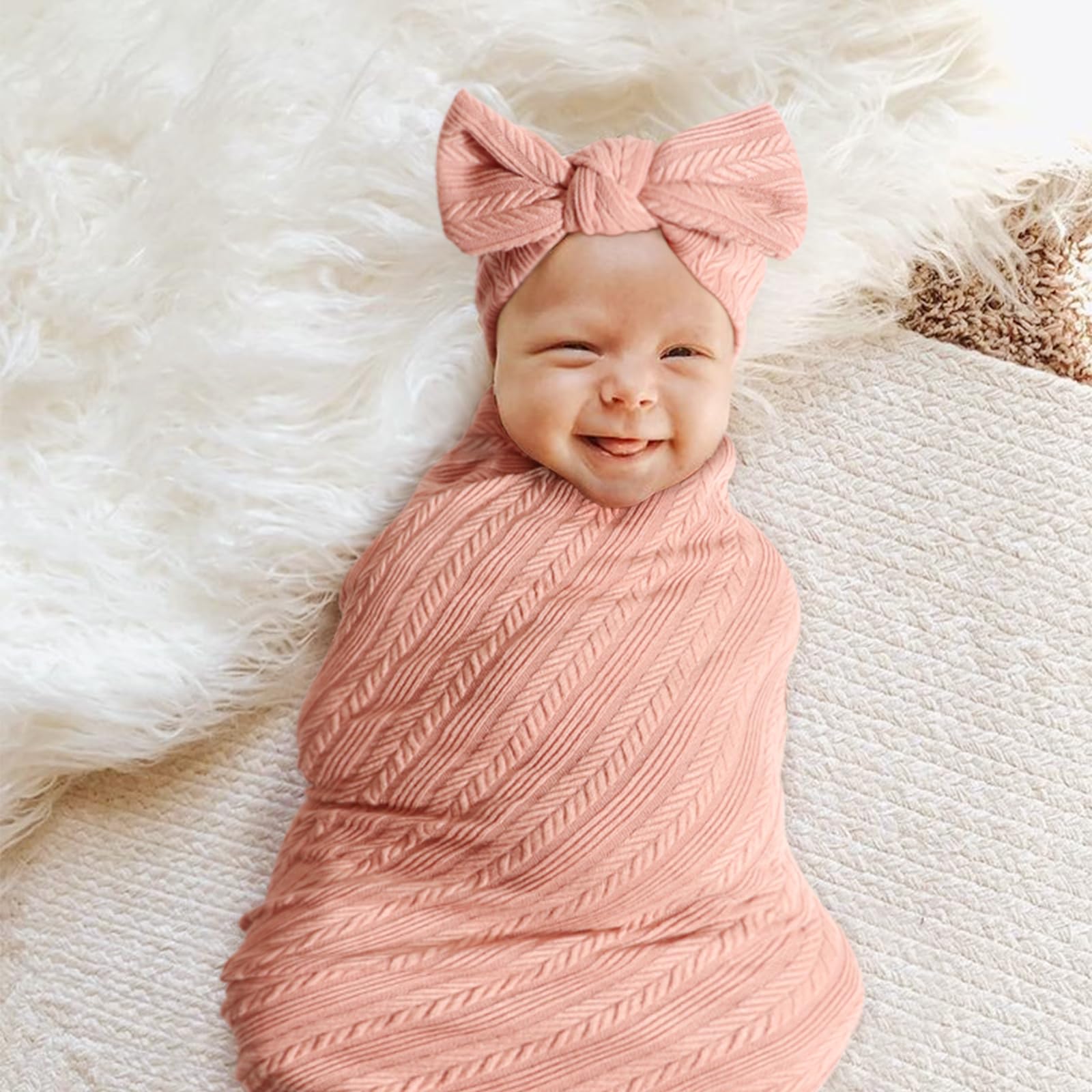 AQOKKA swaddle pictured in hospital setting for newborn arrival comfort.