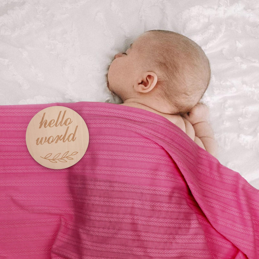 AQOKKA wooden birth-announcement card included with the set