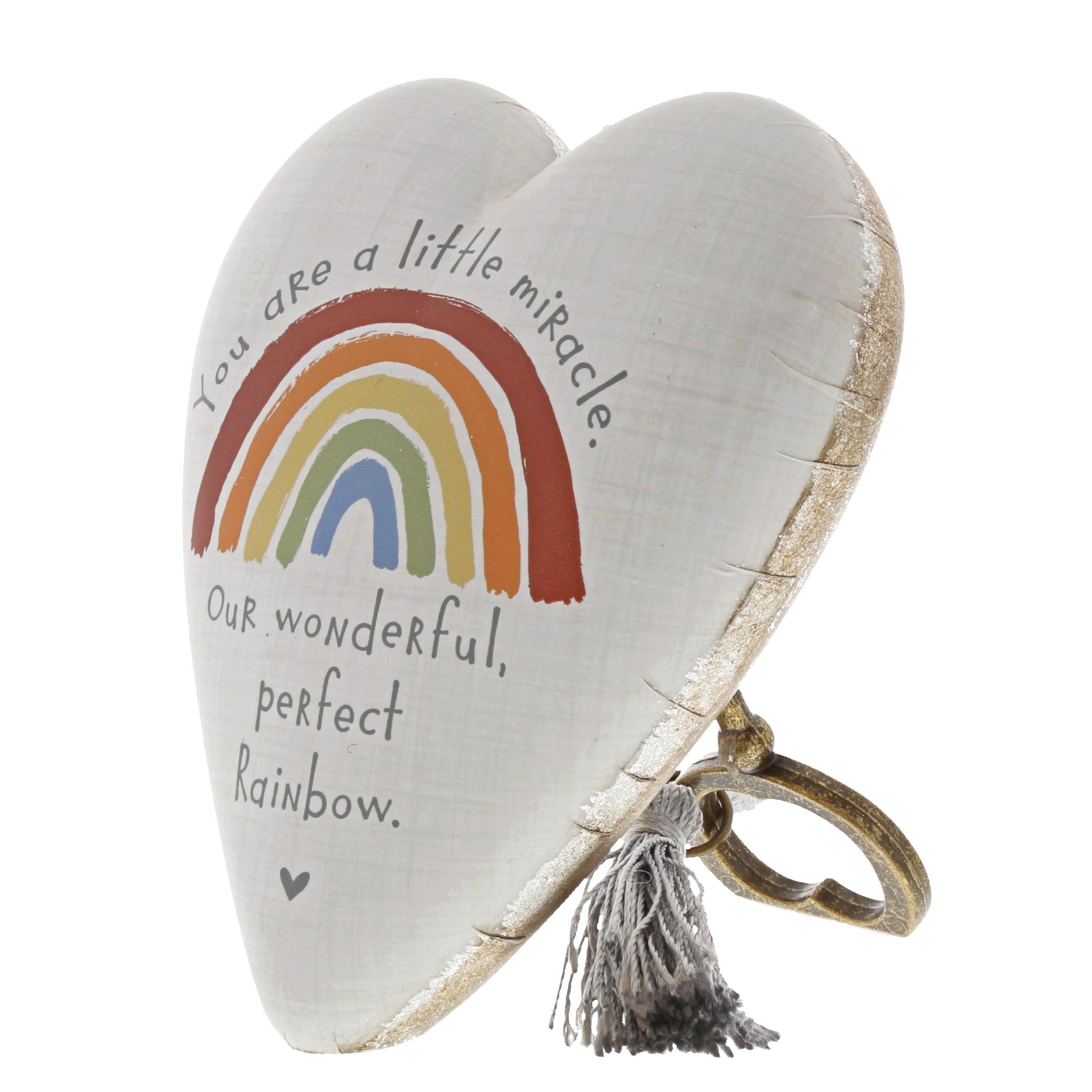 ART HEARTS resin stone material provides durable, decorative tabletop accent.