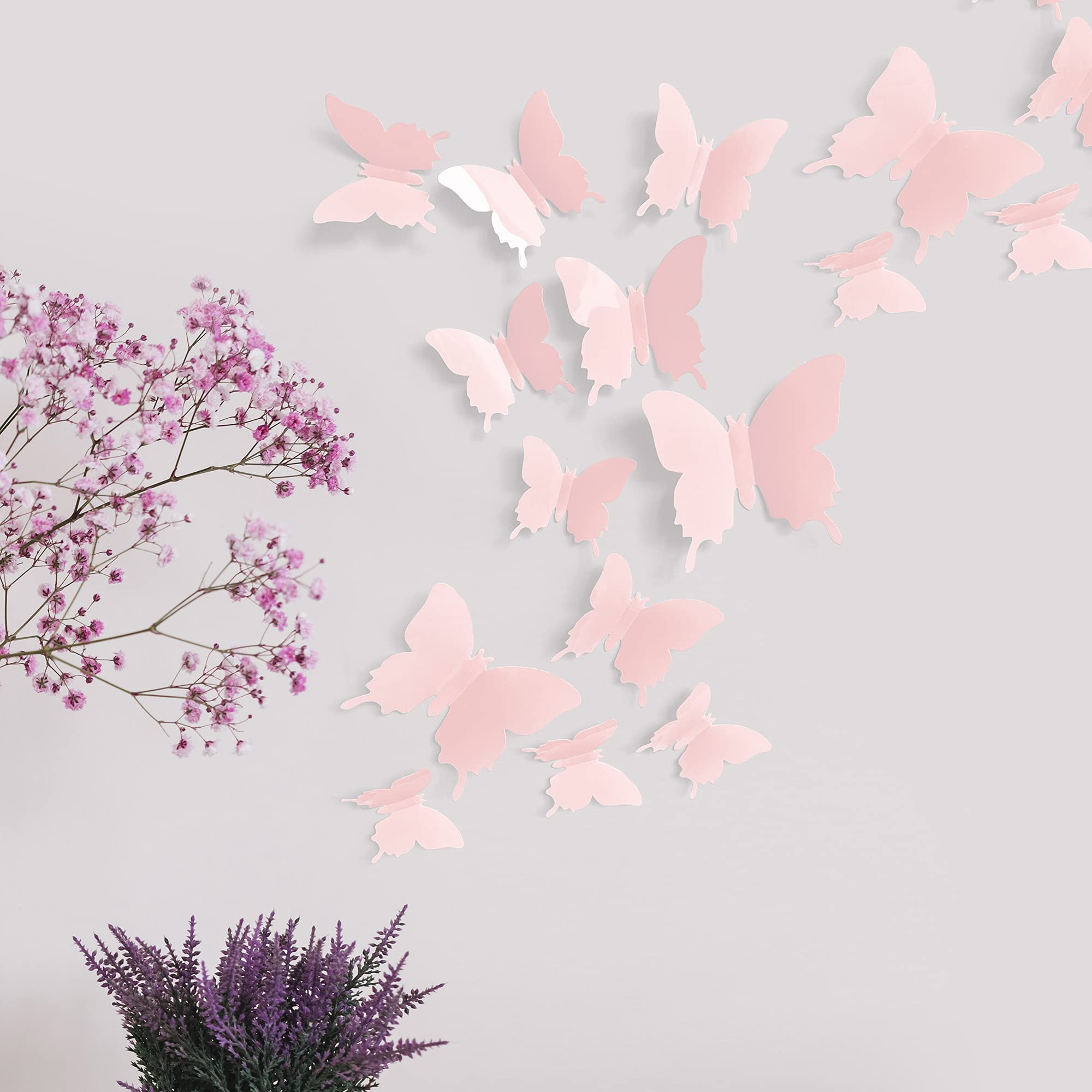 Artivo pastel pink butterfly wall decals, medium butterflies to brighten a toddler room decor.