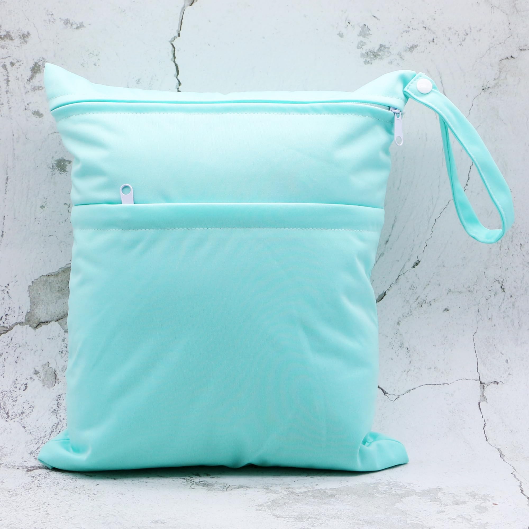 Asenappy wet bag doubles as swimsuit or gym gear storage on the go.