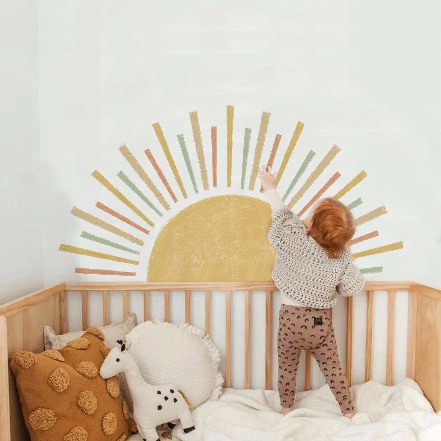 Astrkiz white-wall sunburst decal adds vibrant color to plain walls.