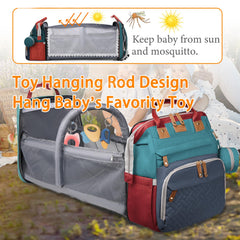 Astro alan diaper bag in waterproof fabric protects essentials during outings.