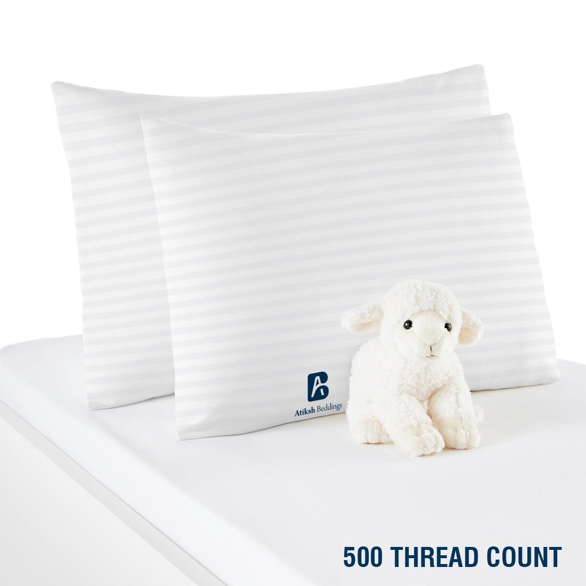 Atiksh Beddings white striped design blends with nursery decor.