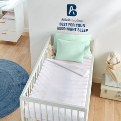 Atiksh Beddings pillow case closeup shows soft fabric for gentle sleep.