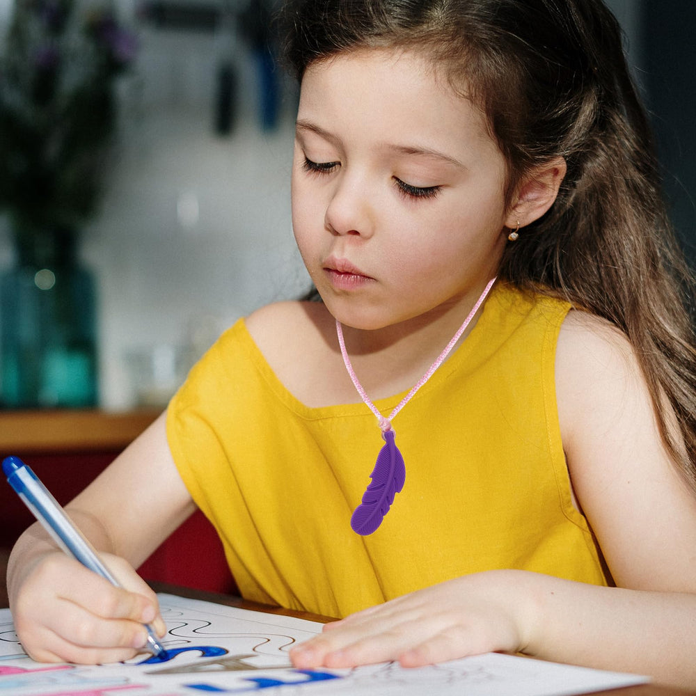 Atsky kids wearing chew necklace demonstrates discreet sensory support.