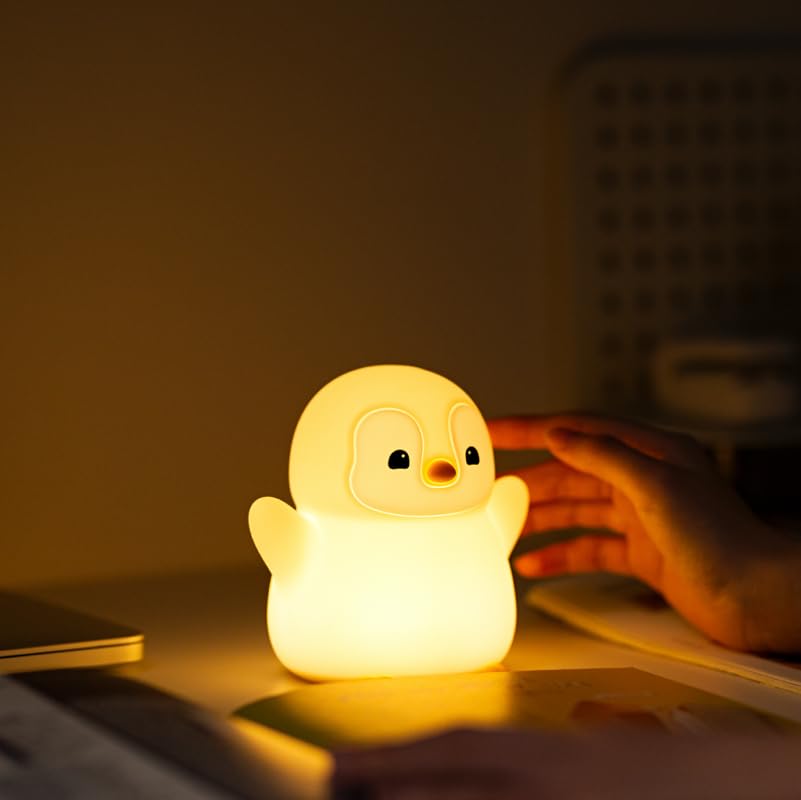 Desk setup with ATSUI Happy Penguin Night Light adds whimsy and soft illumination.