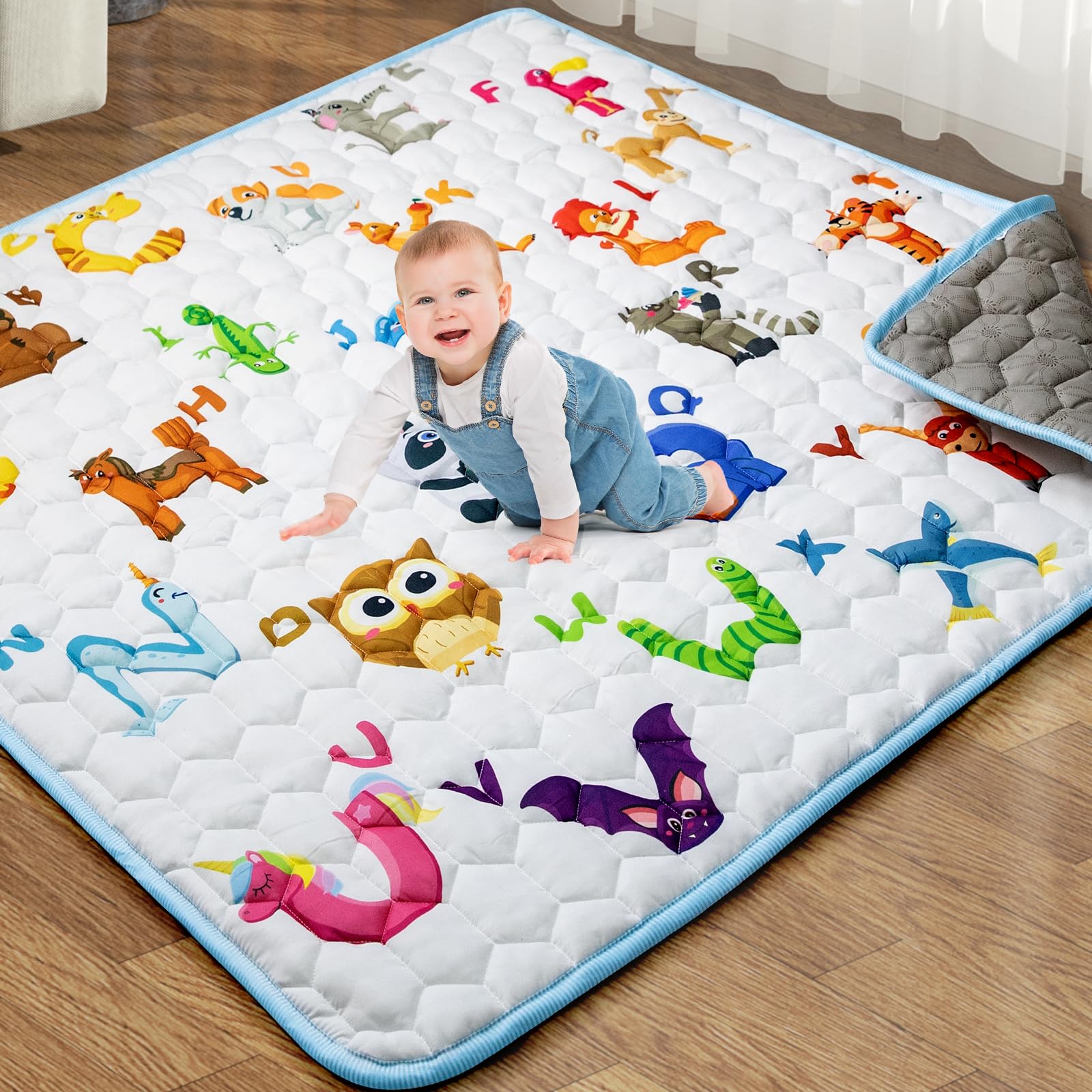 Aukdin baby play mat 71 by 59 cm with thick cushioning for soft landings.