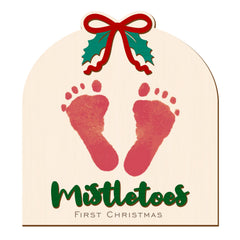 aukolass baby's first christmas footprint sign offers keepsake art for newborn milestones.