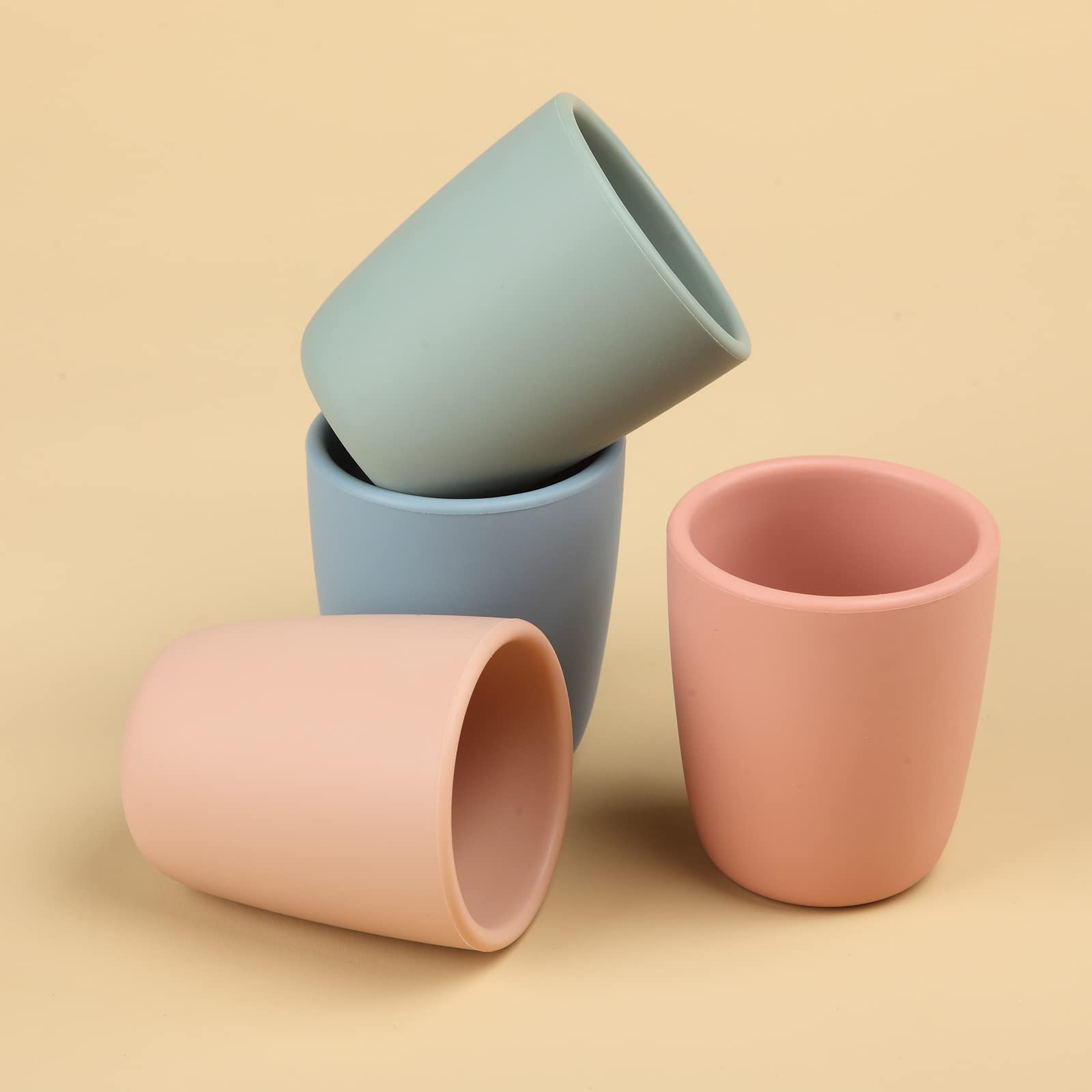 AULEGE unbreakable silicone cup with textured bottom prevents tipping.