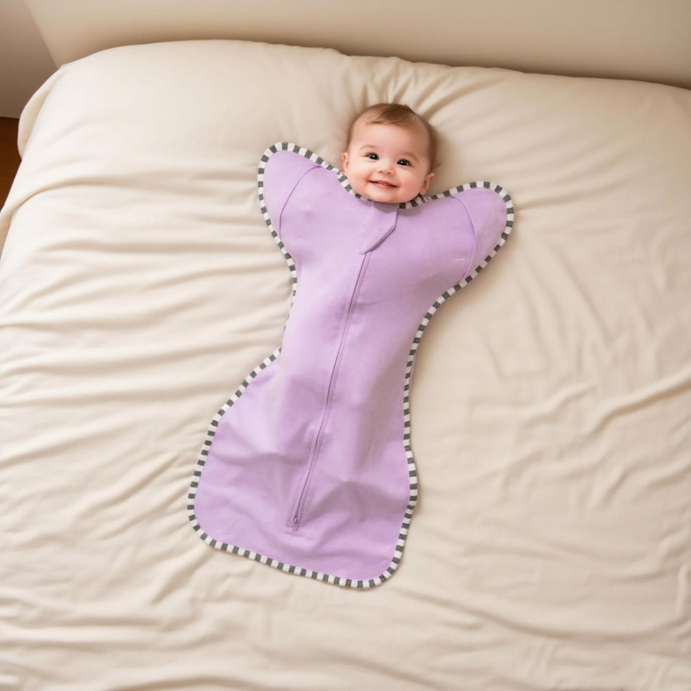 Aullar Baby Transition Swaddle demonstrates a 3-stage transition: arms-in to two-arms-out