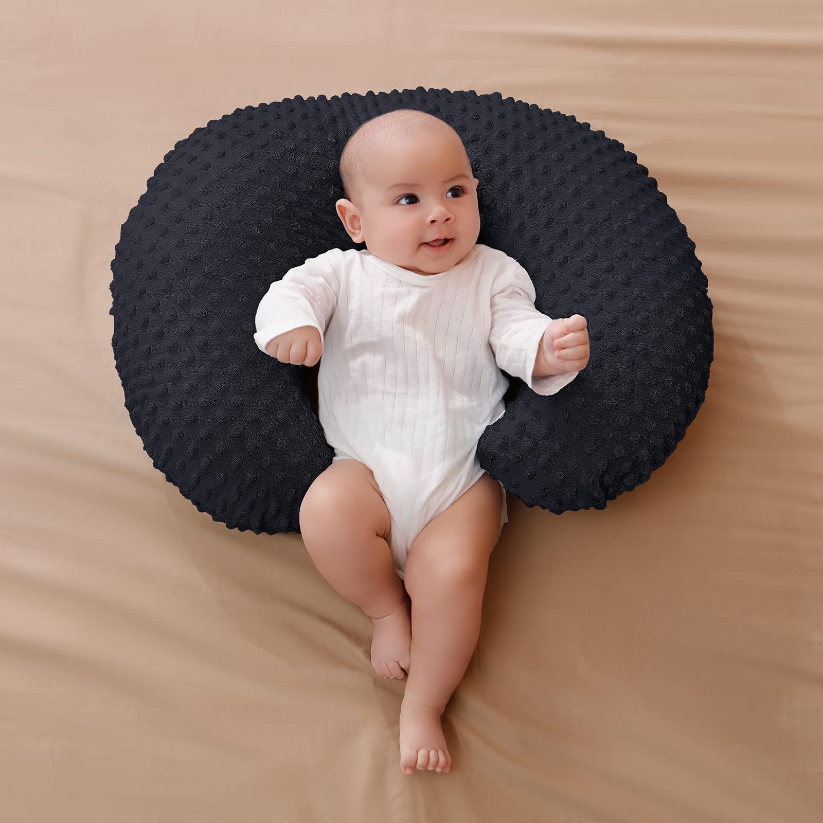 Aullar nursing pillow provides sitting support for early milestones