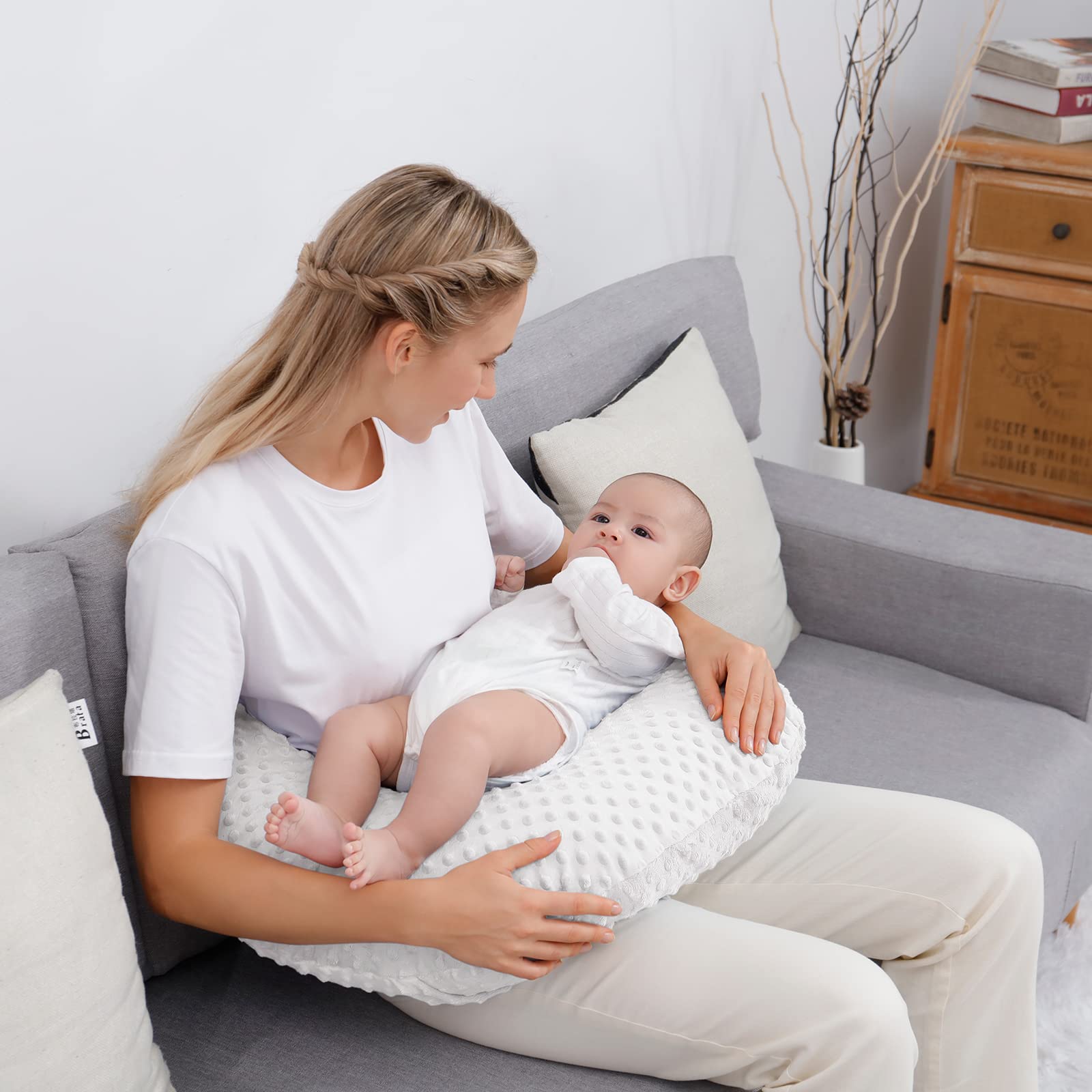 Aullar nursing pillow supports tummy time and playful exploration.